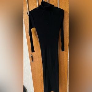 Long sleeve black turtle neck sweater dress. Size small